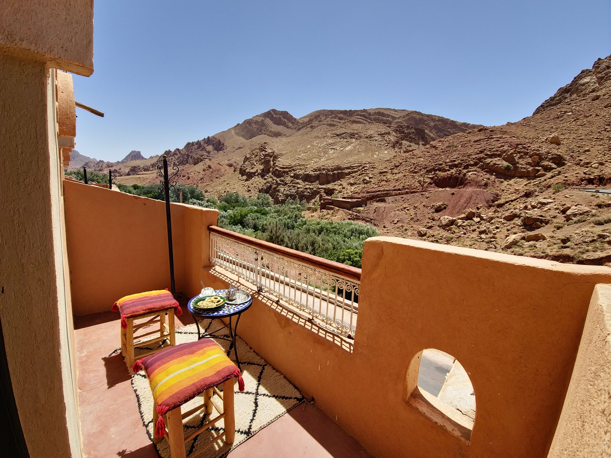 Saada Double Room at Hotel Gorge Dadès — carved cedar and brass details