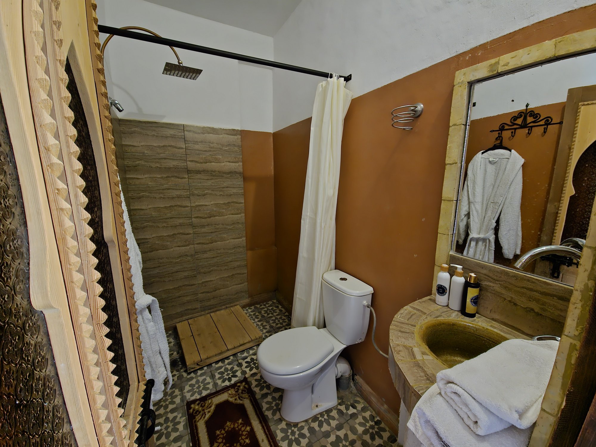 Atlas Triple Room at Hotel Gorge Dadès — carved cedar and brass details