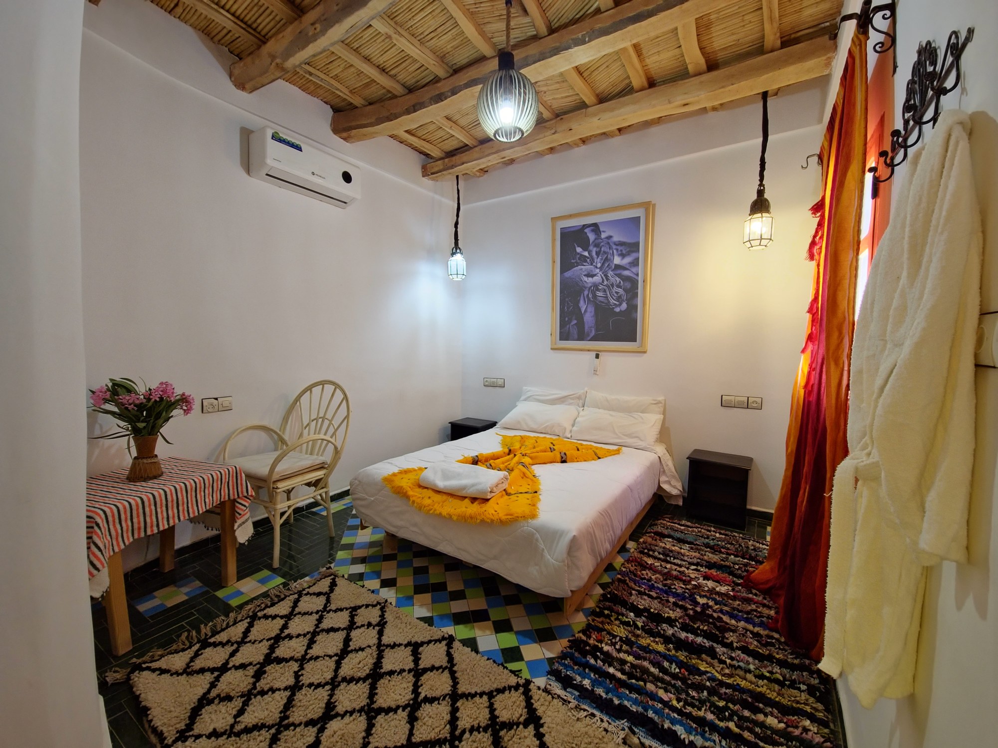 Ayour Single Room at Hotel Gorge Dadès — carved cedar and brass details